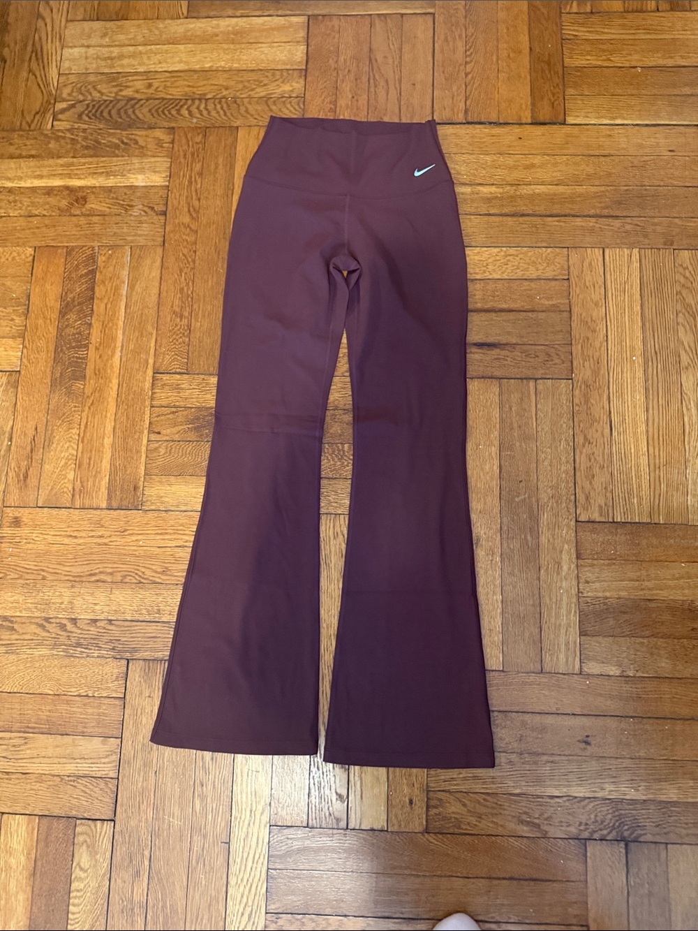 Nike Zenvy Burgundy Flare Leggings with reflective Swoosh
